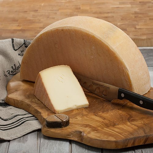 Authentic French Raclette Cheese Whole Wheel, 12 Lbs, Semi-Soft Texture, Ideal for Melting, Perfect for Gourmet Cooking, Product of France