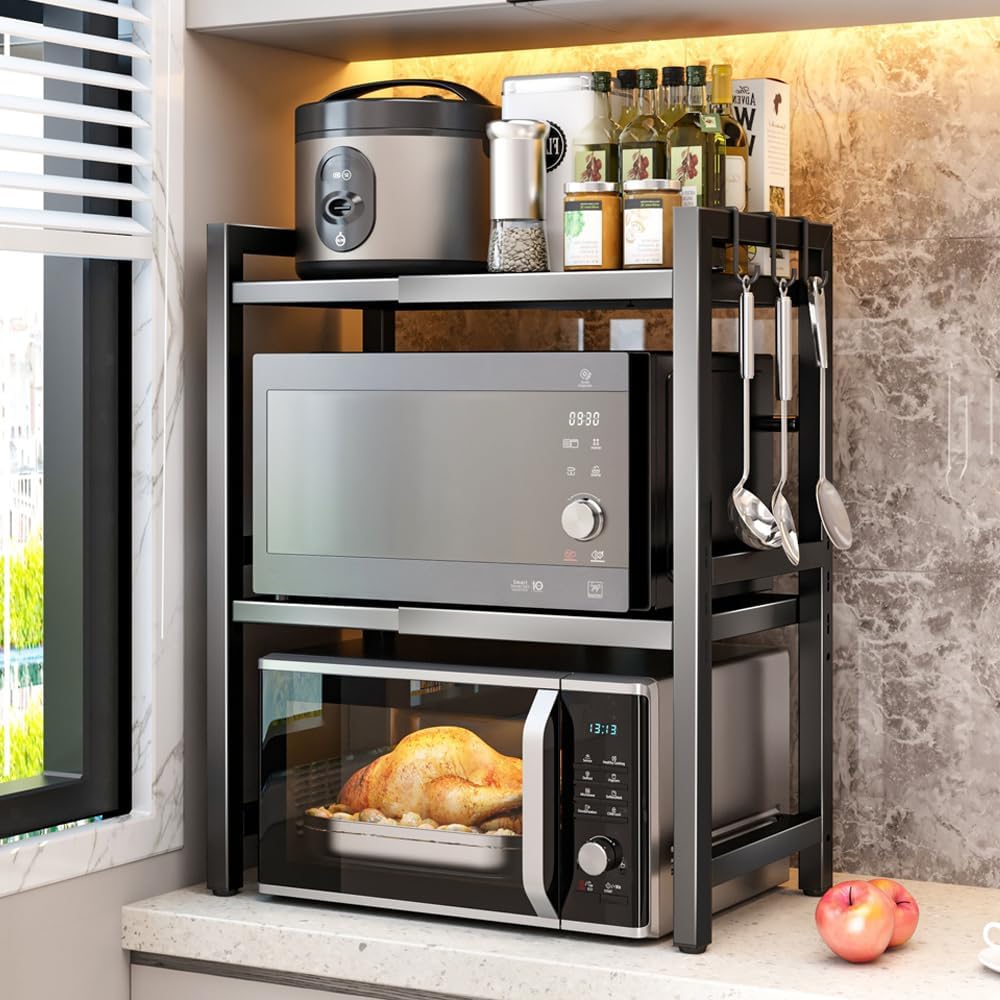 BELIFEGLORY Expandable Microwave Rack with 6 Hooks, Countertop Microwave Shelf Stand Unit, Kitchen Storage & Organisation Spice Baker Rack Coffee Station Organiser (Black / 3-Tier)