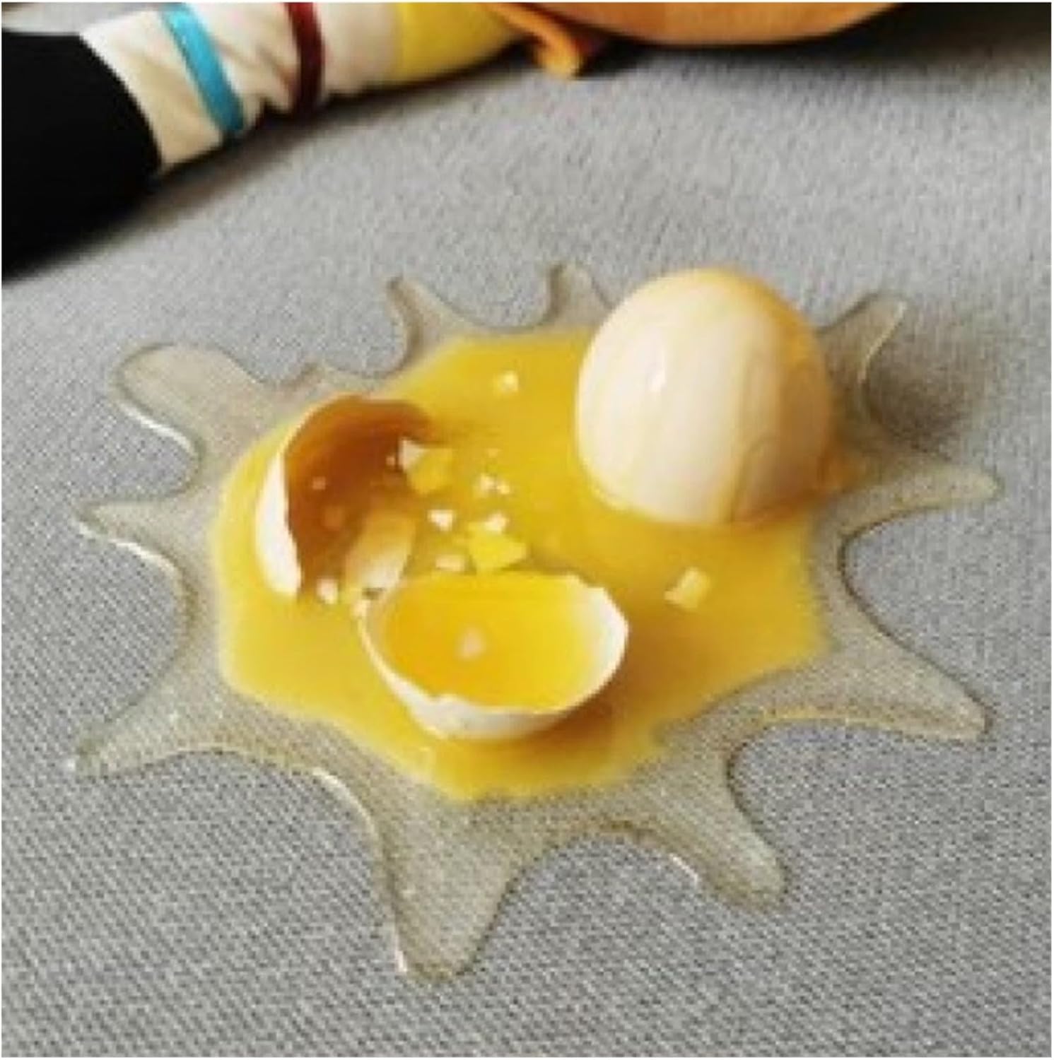 A Toy Prop That Simulates A Strange Broken Egg Cell Phone Stand