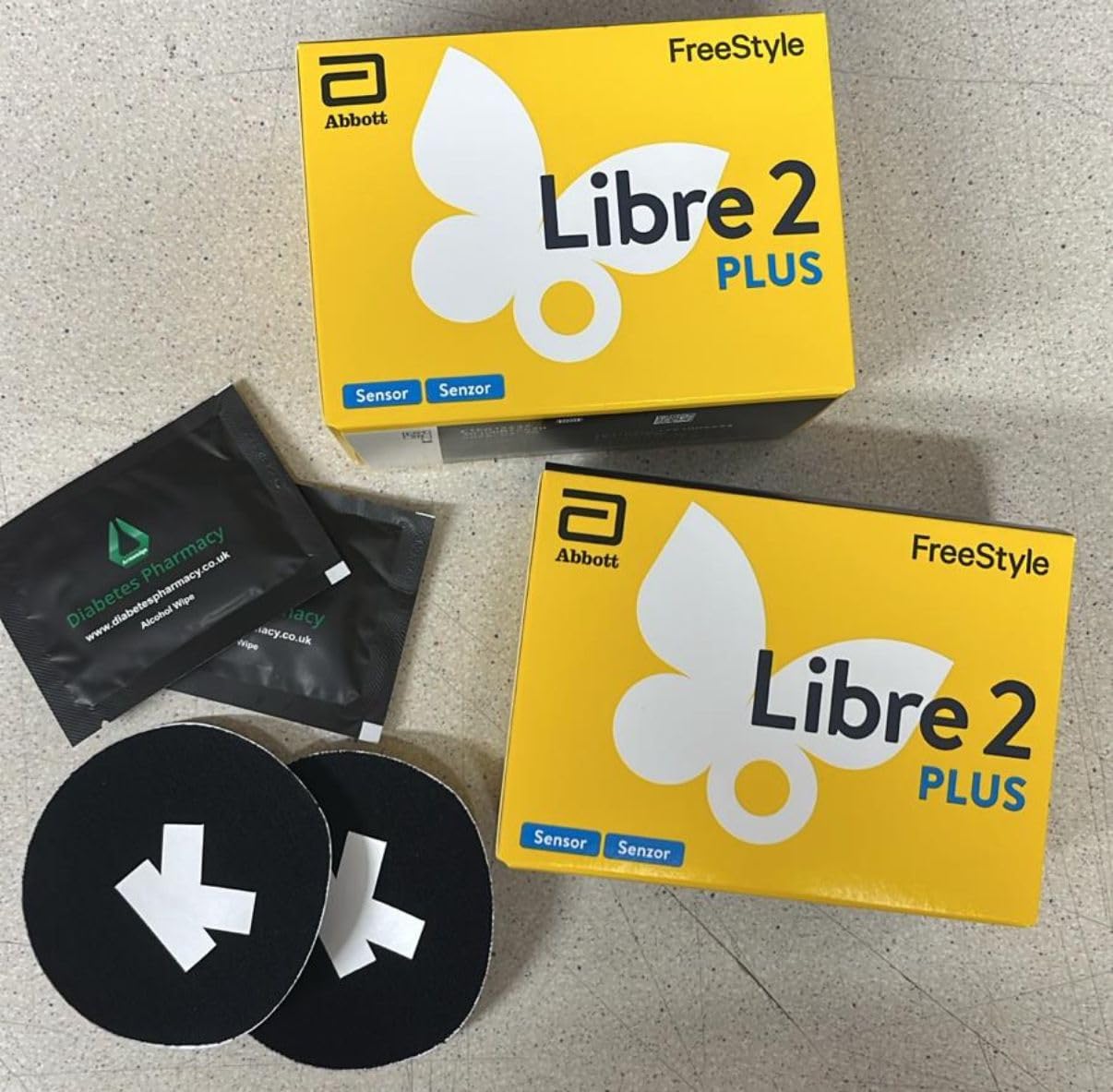 Abbott Freestyle Libre 2 Plus Sensor Pack of 2 for diabetes monitoring CGM for UK + Free (Ultrahuman Skins) alcohol wipe and water proof CGM Patches to be used with LibreLink app UK, reader ONLY
